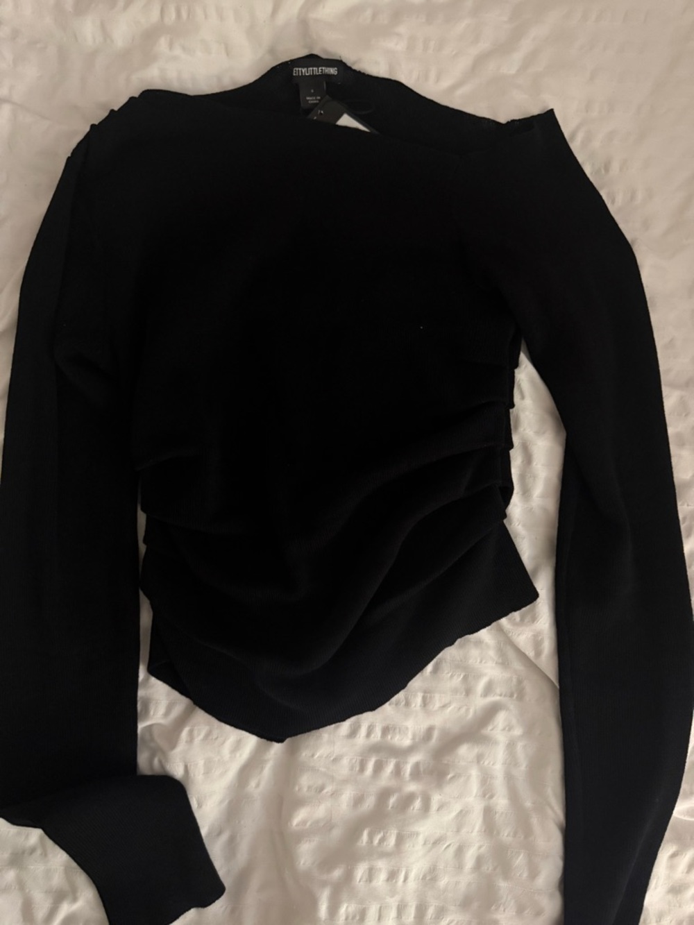 Black fine knit asymmetrical top